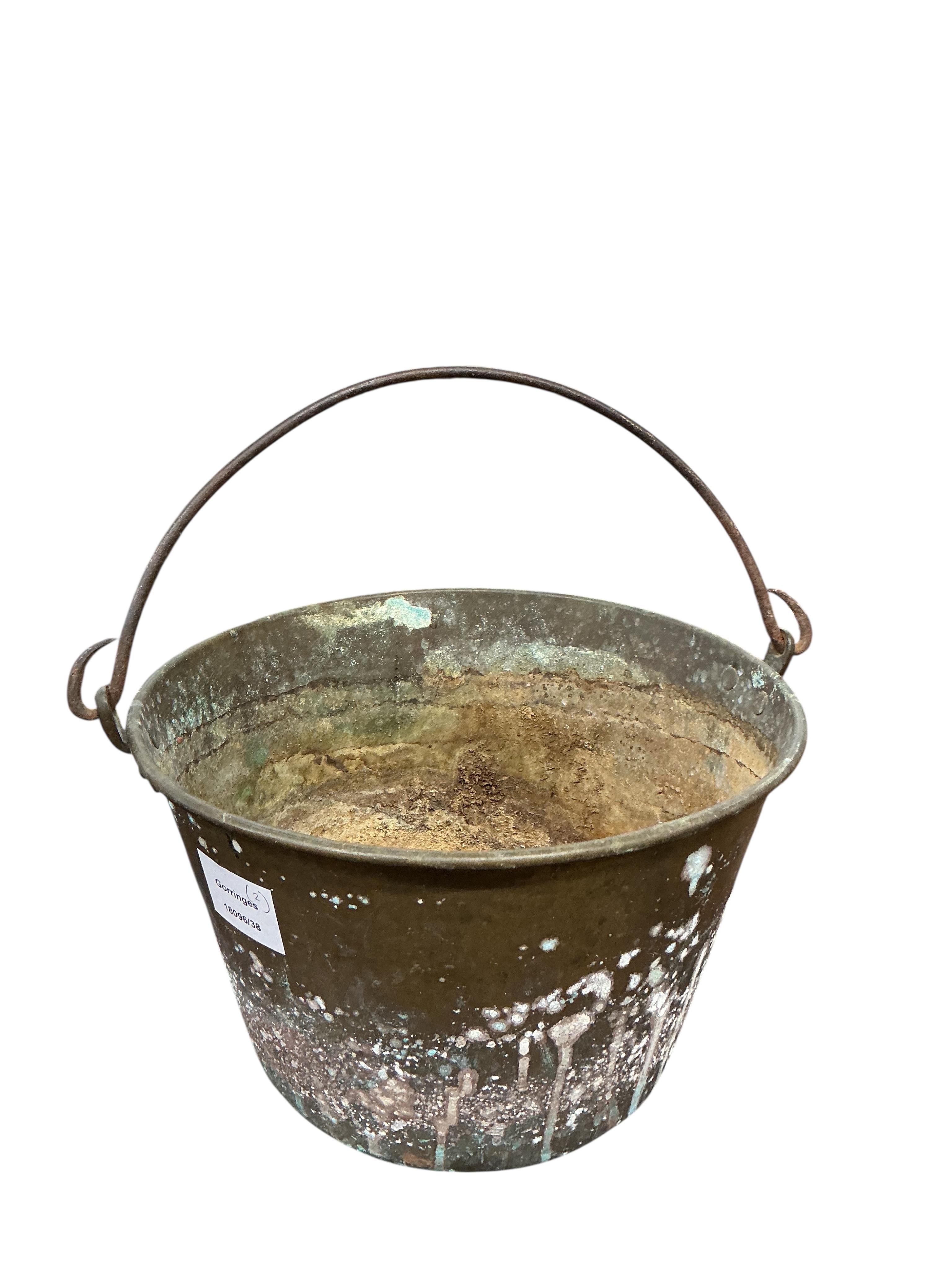 Two 19th century brass pans, larger diameter 34cm